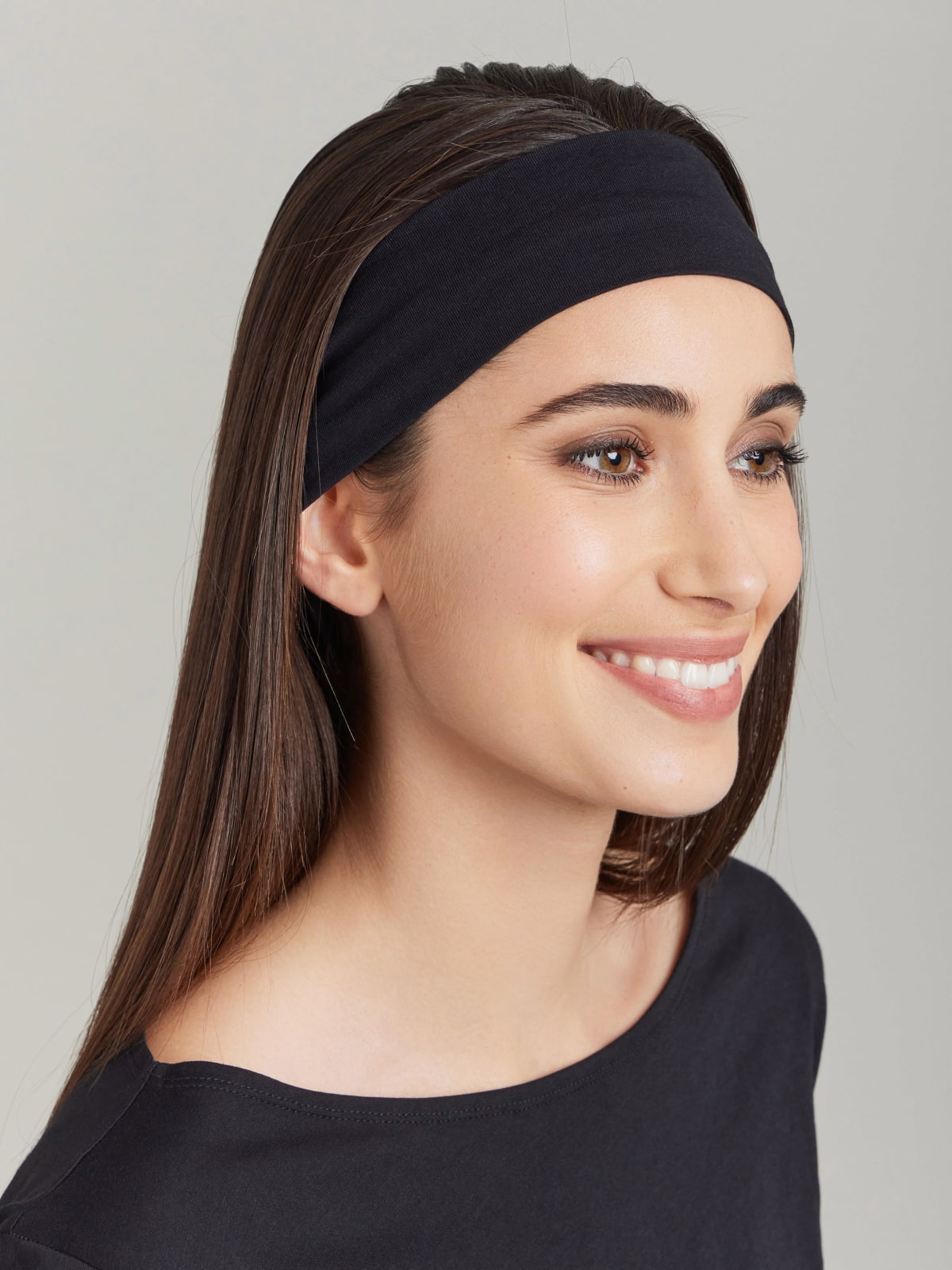 black jersey headband with "b." logo